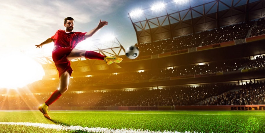 Soccer player in action panorama